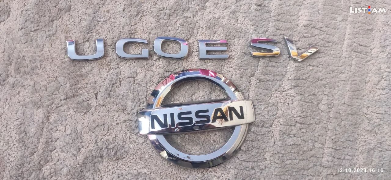 Nissan rogue emblem